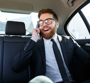 woman-using-mobile-while-car 1